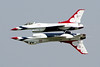 The lead solo is Thunder Bird number 5. He does all the inverted passes. Notice the number 5 on the aircraft is "upside down" This is because when he is upside down, his numbers are right side up. The numbers are also "upside down" on his helmet, mask, and flight suit.